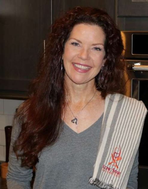 Rani of Lone Star Gatherings in her kitchen smiling