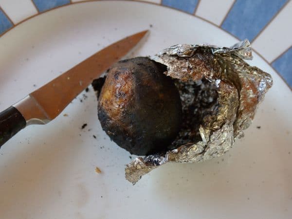 Burnt potato in foil