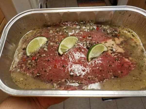 Beef flank steak marinating