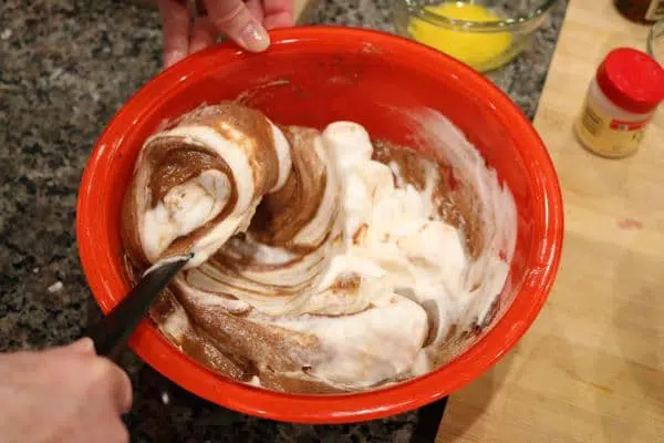 mix egg whites into chocolate for perfect chocolate soufflé step 3