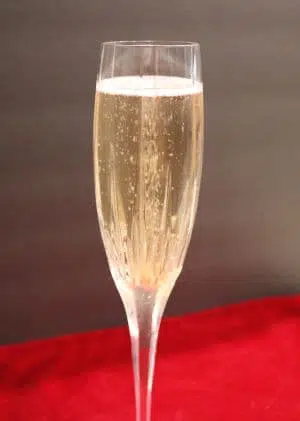 Christmas Prosecco Cocktail Bubbling in a flute