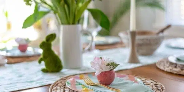 Easter Table setting with moss rabbit and eggshell with flowers
