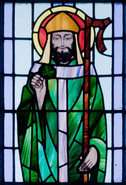 Saint Patrick depicted in a stained-glass window at Saint Benin's Church, Ireland