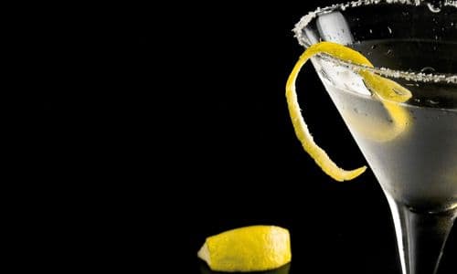 Limoncello Martini recipe garnished with spiral of lemon on rim