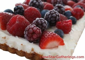 No-Bake Cheesecake with berries and logo