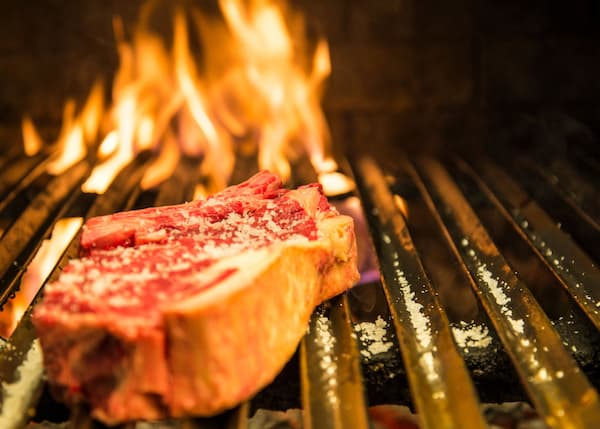 Avoid flare-ups like this when finding the best temperature to grill steak
