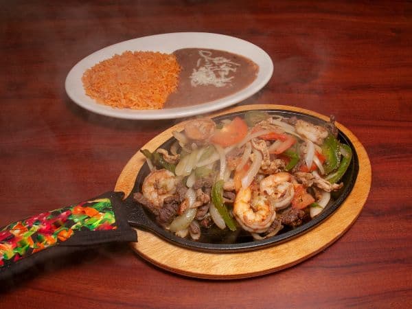 Shrimp and beef fajitas with rice and beans