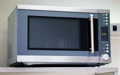 a microwave oven on countertop