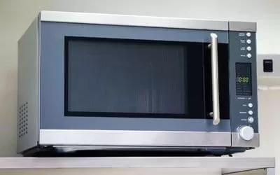 a microwave oven on countertop