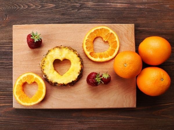 Use cookie cutters to cut soft fruit into shapes
