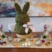 Gold and jewel-toned eggs with moss Easter Bunny Tablescape