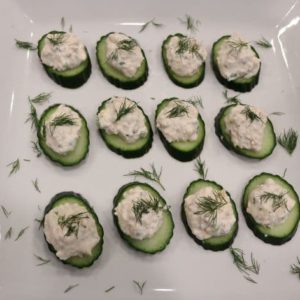 Close up of Creamy Salmon on Cucumber slices