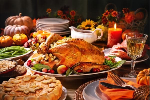 Bounty of food with Turkey and pies