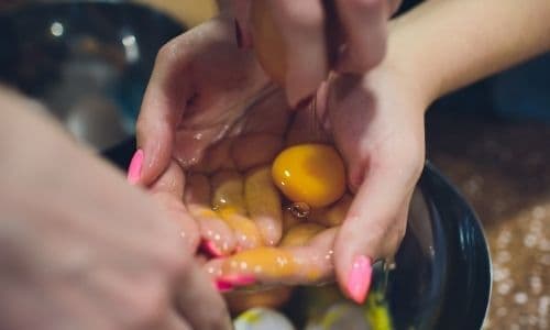 Separating eggs for chocolate soufflé recipe